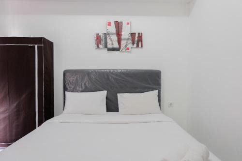 Pagedangan Apartment | Modern Studio Casa De Parco Apartment By Travelio