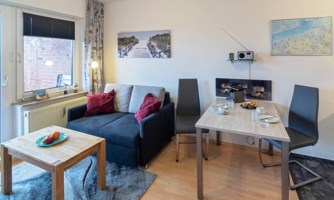 Dornum Apartment | Modern upper apartment Asgard with a view of the canal