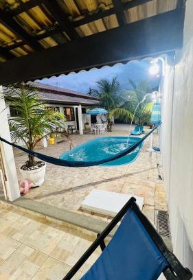 Santa Terezinha House | Morada do Zinho - Piscina, churrasqueira, lareira e 250 metros da praia