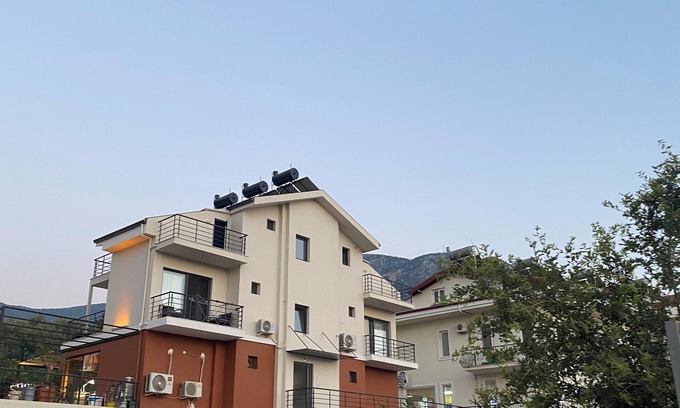 Oludeniz Apartment | New, bright 1+1 flat in Oludeniz with a view.