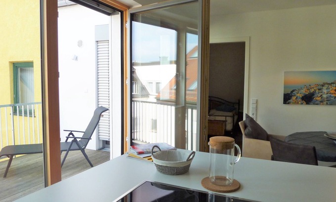 Freising Apartment | New! Freising center Luxury Overlooking the rooftops with balcony overlooking the Cathedral Hill