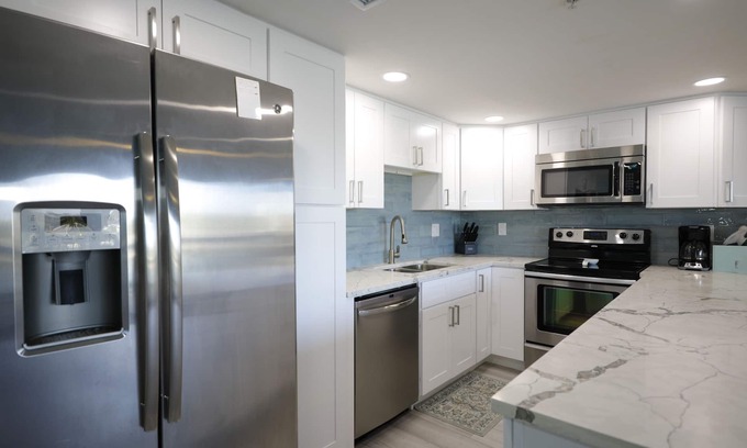 Indian Rocks Beach Condo | NEW LISTING Beachfront steps to beach with Remodeled Kitchen, Quartz Countertops