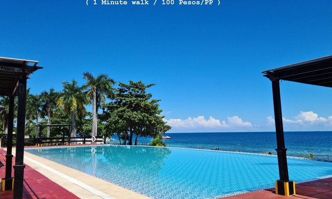 Lapu-Lapu Condo | new Lux. 2BR condo + 2 pools, woow oceanviews, Gym, Beach, behind Mactan Newtown