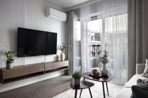 Krzyki Apartment | NEW #Madalińskiego57 - city center, new bulding, 2 bedrooms, 2x double beds and a fold-out sofa, separate kitchen, air conditioning, balcony, underground parking, self check in 24h, internet, Netflix, coffee machine, washing machine,1 km to the railway