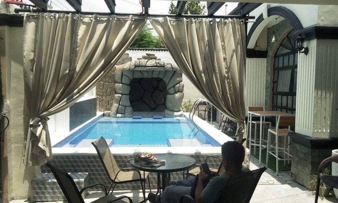 Balibago House | New Pool terrace with Fish pond. Outdoor movie entertainment for enjoyment.