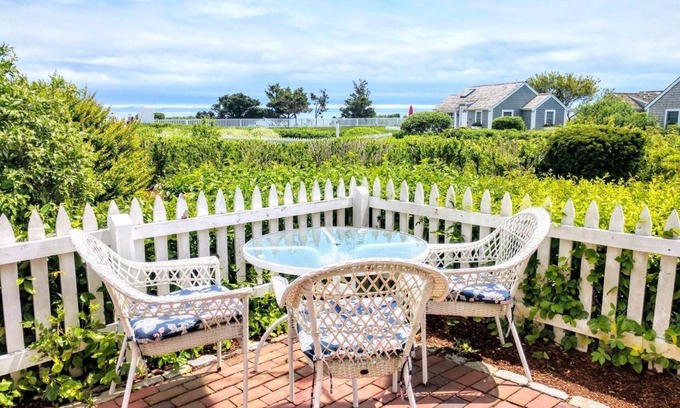Mashpee Cottage | New Seabury cottage, stunning ocean views, steps to private beach in maushop