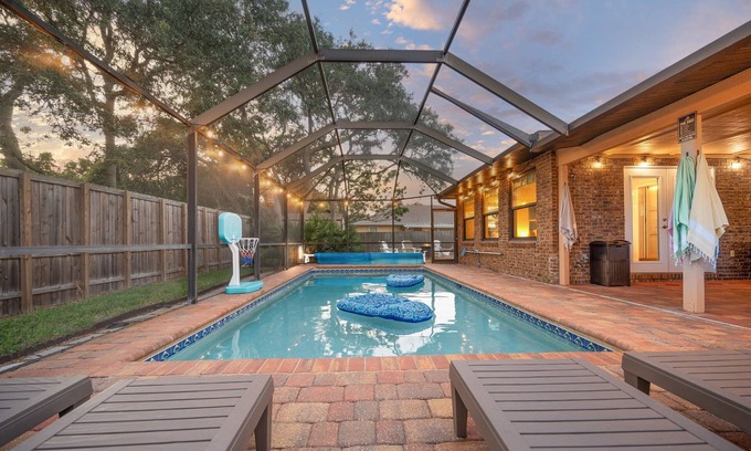 Butler Beach House | NEW The Crooked Palm! Walk to Butler Beach ︴Heated Pool ︴Pet Friendly ︴Fire Pit