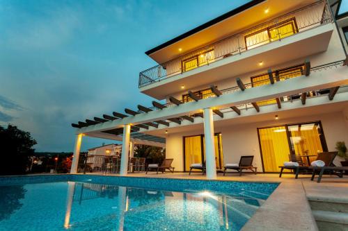 Malinska-Dubasnica Villa | New villa with large pool, sea view, 300 m from the beach - by TRAVELER tourist agency Krk - ID 2191