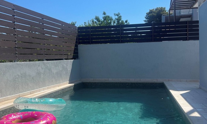 Souvala Villa | Newly built apartment with a private pool and garden, part of a villa.