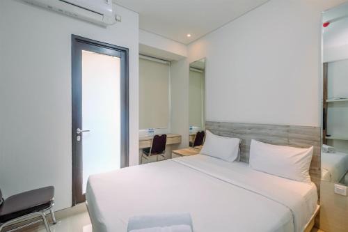 Depok Apartment | Nice and Cozy Studio at Transpark Cibubur Apartment By Travelio