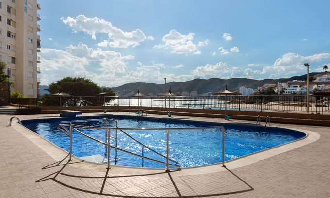 Faro de Cullera Apartment | Nice apartment for 4 guests with WIFI, pool, TV and balcony