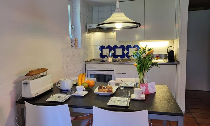 Capriasca Apartment | Nice apartment for 5 guests with pool, WIFI, TV, patio and pets allowed