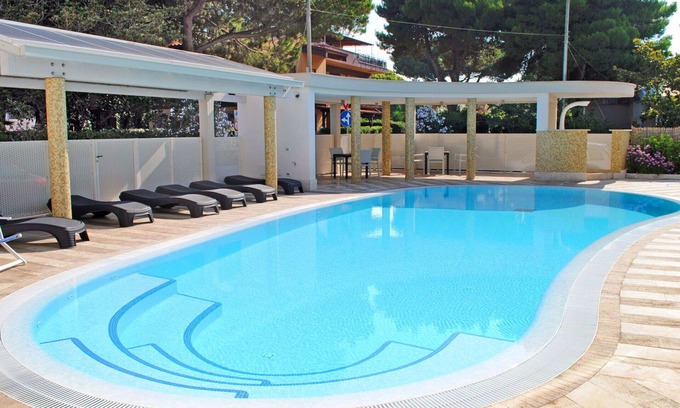 Latina Lido Apartment | Nice apartment for 5 guests with pool, A/C, WIFI, TV, balcony and pets allowed