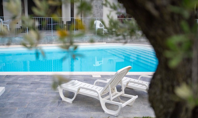 Silvi Villa | Nice apartment in villa for 4 guests with WIFI, A/C, pool, TV, patio and pets allowed