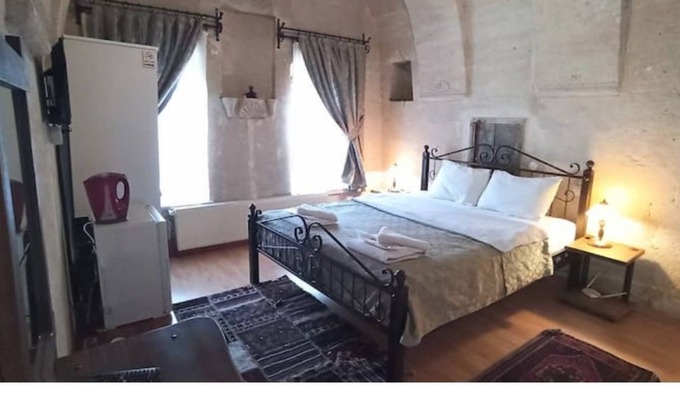 Goreme House | Nomads - Traditional Arch Stone room at the center