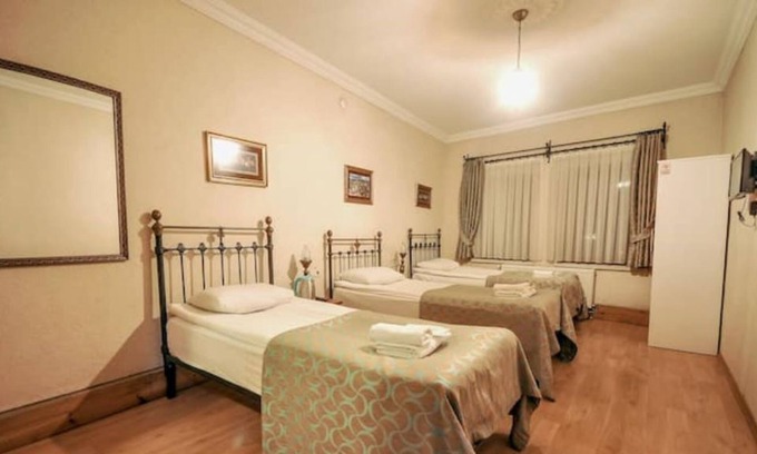 Goreme House | Nomads - Triple Room at the heart of Cappadocia