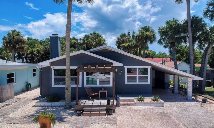 New Smyrna Beach House | North Beach rental! 2 Bedroom, 1 flex room and 1 bath home, just one block from beach access and Grayce Barck Park with nature trails.