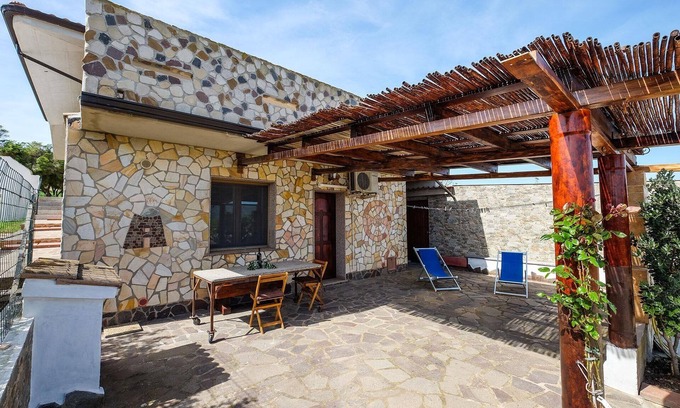 Gonnesa Apartment | Nuraghe vacation apartment on an olive grove on the outskirts of the town, barrier-free, WLAN,