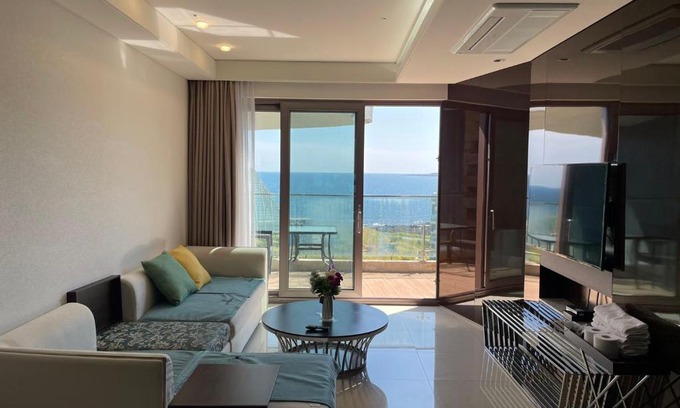 Seongsan Apartment | Ocean star condominium (phoenix Island ) AA