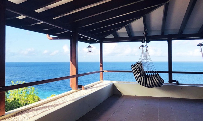 Bisento House | Ocean view villa in gated community beside Cas Abao beach.