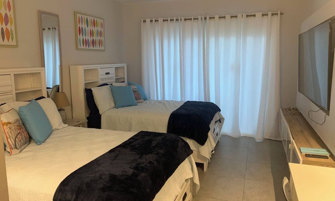 Dorado del Mar Apartment | Ocean Wave II, Studio Suite 2 full beds at Aquarius