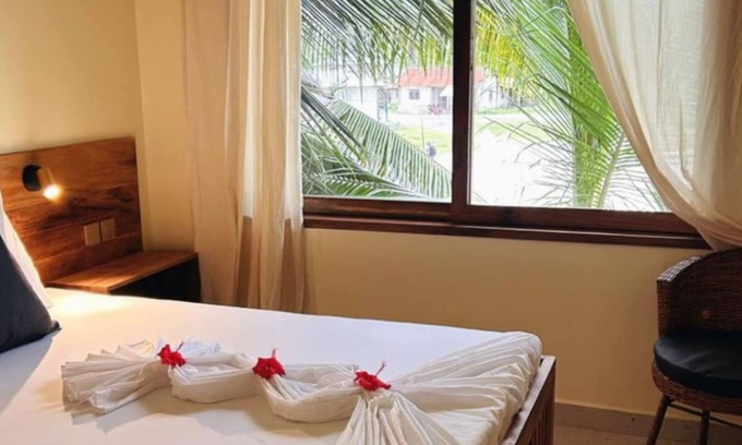 Jambiani Apartment | Oceanfront Retreat in Jambiani, Tanzania - Private Room with Balcony