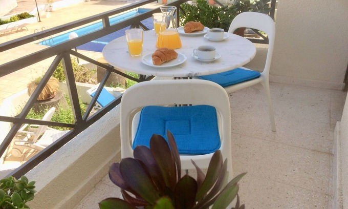 Paphos Apartment | Olympian pool view, 5 mins walk to seafront and beaches.