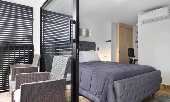 Medellin Apartment | One Bedroom Balcony AC hot tub apartment with part time security
