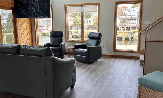 Colington Harbour House | Open Concept Home on Canal. Great for Boating Fishing Crabbing and Swimming.