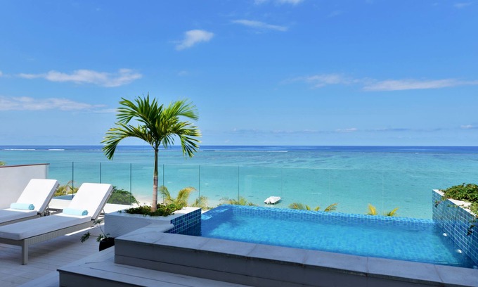 Wolmar Apartment | OPEN SKY penthouse | Cap Ouest, Wolmar | Feet in the water | Cleaning & cooking