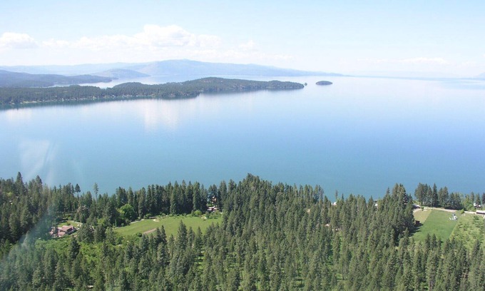 Finley Point House | Orchards & old growth forest surround this Finley Point Home.