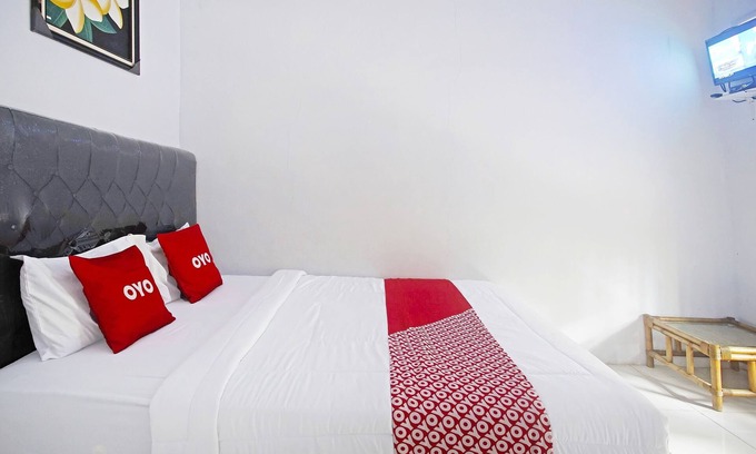 Kalianda Hotel | OYO 90229 Fidel Caestro Homestay