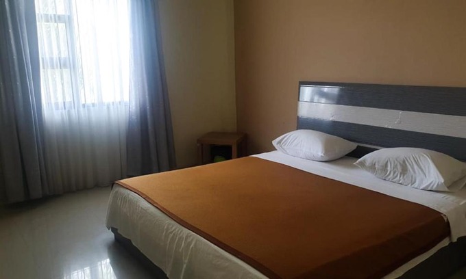 Balikpapan Hotel | OYO 91266 Markoni 18 Guest House