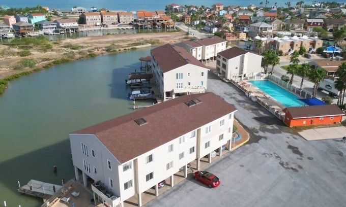 Port Isabel Condo | Oyster Cove (2-Bedroom Condo) with Pool by RedAwning