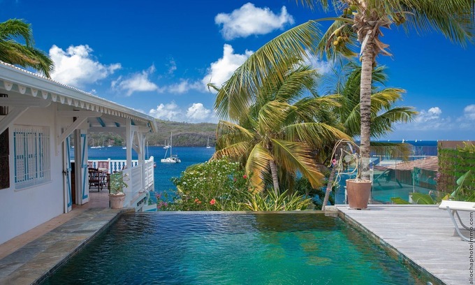 Les Anses-d'Arlets Villa | Panoramic bay view, Direct beach access, Private jetty, Luxury colonial villa