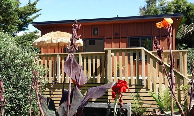Waihi Beach Cabin | Peace of Bali 1 bed cabin set in a tropical garden with WiFi & AC in Waihi Beach