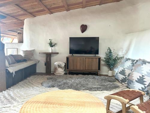 Valdez House | Peaceful Mt Top Earthship Retreat with Sauna & Views