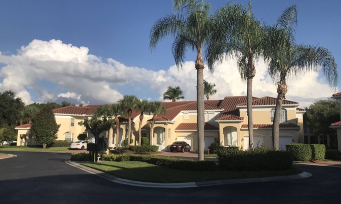 Pelican Bay Condo | Pelican Bay, Lambiance Garden Condo, second floor with full lake western view.