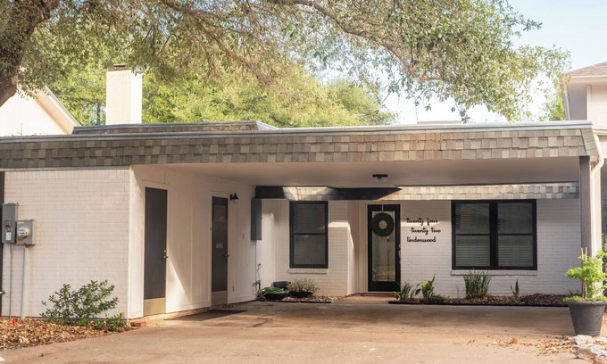 San Angelo House | Perfect blend of style and serenity in this 3-br, 2-bath bungalow guest house.