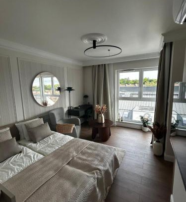 Emaus Apartment | Perspektywa Apartment with balcony by Lion Apartments