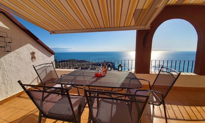 Cumbre del Sol Apartment | Pet-friendly Apartment Casa Panorama with Sea View, Pool, A/C, Wi-Fi & Terrace