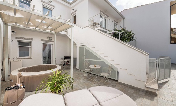 Villasimius Apartment | Pet-Friendly Apartment 'La Casa dei Naviganti' with Courtyard, Jacuzzi & Wi-Fi