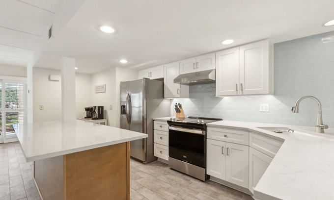 American Beach Condo | Pet Friendly | Ground Floor Sailmaker Villa | Covered Patio with Pool View