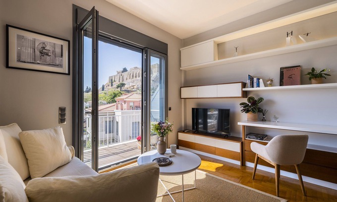 Plaka Apartment | Phos, an eclectic suite with stunning Acropolis view.