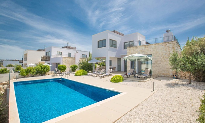 Lakatamia Villa | Picture Relaxing Beside Your Private Pool in Your Villa Reading Your Favourite Book