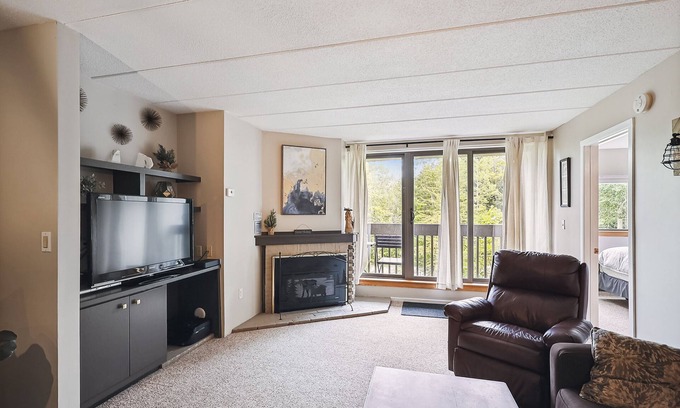 Killington Condo | Pinnacle F08 Cozy, charming and renovated offering shuttle to the slopes everyday of the week. Pinnacle F08 The outdoor pool, hot tub, and, tennis courts are open during summer only.