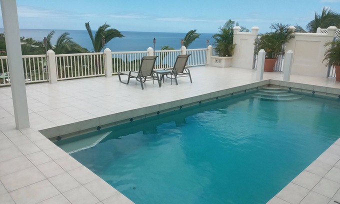 Oualie Bay Apartment | Poolside Veranda Suite at Eden Villa. Private Pool, Suzuki jeep. 1-3 Guests.