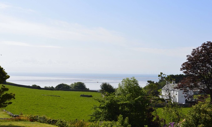 Sandyhills Cottage | Portling View - an apartment that sleeps 6 guests in 3 bedrooms