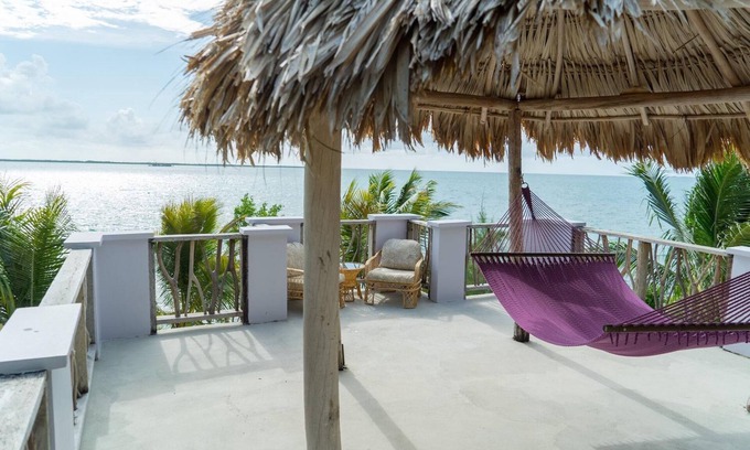 Thatch Caye Resort | Premier Oceanfront Cabana w/Private Roof Patio & Incredible Ocean Views