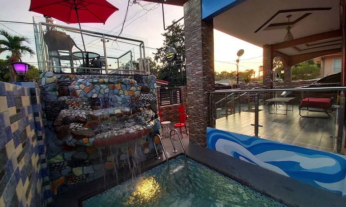 San Narciso House | Prestige Grounds Guesthouse with Lap Pool and Billiards